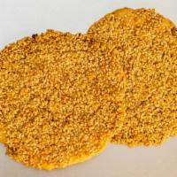 Sesame Cookie · Barazik are lightly sweetened thin cookie coated with pistachio on one side and sesame on th...