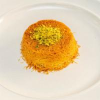 Knafeh  · Buttered shredded fillo dough filled with your choice of cream or cheese, baked to perfectio...