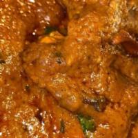 Chicken Curry · Chicken with bone or Boneless in onion, garlic, tomatoes, herbs and spices.
