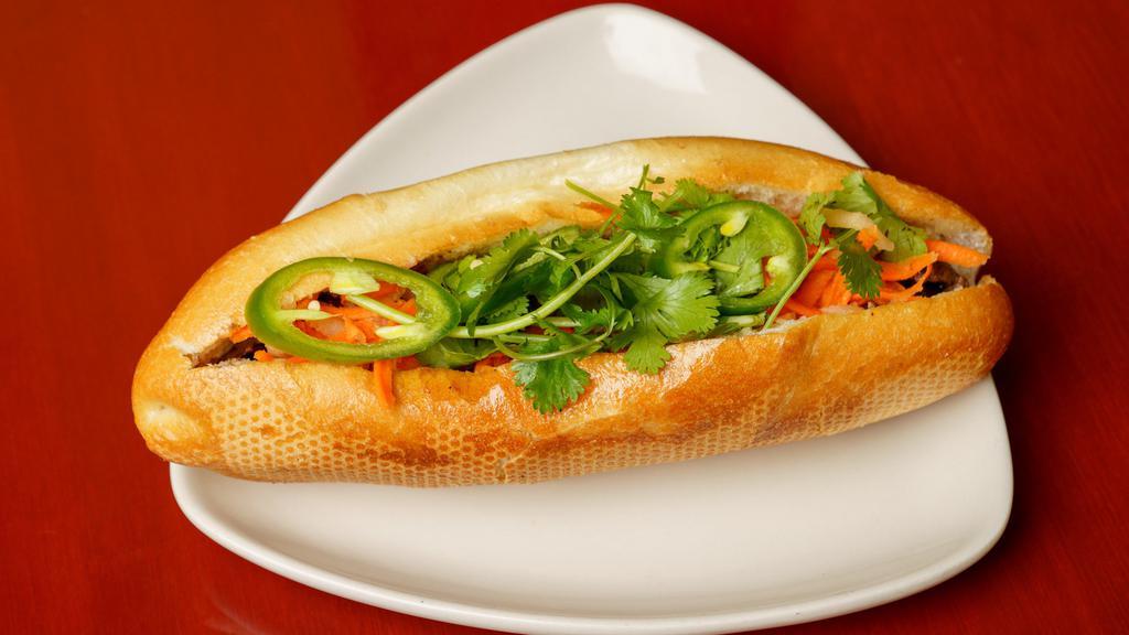 Banh Mi (Vietnamese Sandwiches) · Traditional Vietnamese-French Baquette Lettuce, cucumber, cilantro, carrots, daikon, soy sauce, mayonnaise,  & sliced jalapeno peppers w/choice of: