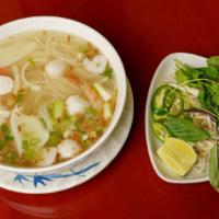 #22 Hu Tieu My Tho - Seafood Pho · Seafood noodle soup (fresh chicken stock) w/calamari, fish balls, shrimp, & Imitation crab, ...