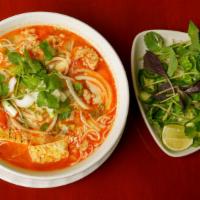 #24 Bun Rieu (Northern Style Specialty Noodle Soup Bun Rieu) · Northern-Vietnamese specialty soup, a crab & shrimp tomato paste stock served w/thin Vermice...