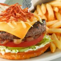 Americana Cheeseburger · American and Cheddar Cheese, Crunchy Potato Crisps, Lettuce, Tomato, Grilled Onions, Pickles...