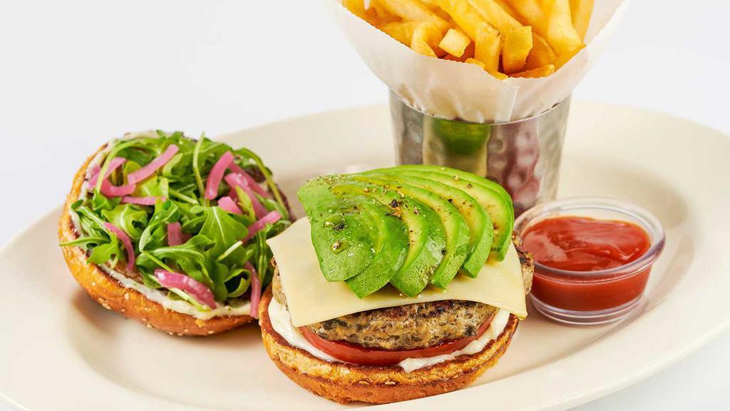 Factory Turkey Burger · Combined with Fresh Mushrooms, Garlic and Spices. Charbroiled with Fontina Cheese, Avocado, Tomato, Arugula and Marinated Onion. Served on a Wheat Brioche Bun with Garlic Aioli