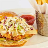 Fried Chicken Sandwich · Chicken Breast Fried Crisp with Cheese, Cole Slaw, Pickles and Mayonnaise. Served on a Grill...
