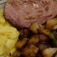 Ham And Cheese 3 Egg - Omelette · 3 fresh eggs prepared with diced ham, melted cheddar cheese served with hash browns or count...