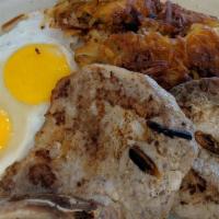 Pork Chops · 2 pork chops served with 2 eggs, hash browns or country potatoes and toast