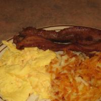 2 Eggs And 4 Slices Of Bacon · 2 eggs cooked to your satisfaction with 4 slices of bacon and hash browns or country potatoes