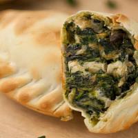 House made Spinach Feta Empanada · Organic spinach, onions, Feta cheese and a blend of jack and cheddar cheese