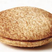 Snickerdoodle Traditional Alfajor · America meets Argentina - Shortbread cookies joined with dulce de leche and sprinkled with c...
