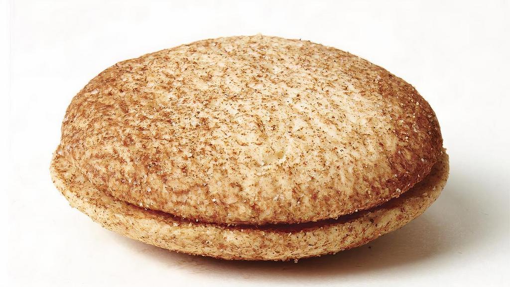Snickerdoodle Traditional Alfajor · America meets Argentina - Shortbread cookies joined with dulce de leche and sprinkled with cinnamon and sugar. New England just fainted. We assure you that our cinnamon has never been used to embalm mummies, to crunch toast, to repel moths, or to trade with the Dutch. Just sprinkling.