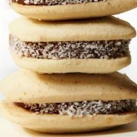 Gluten Free Traditional Alfajores · Shortbread cookies, made with no gluten ingredients, joined with dulce de leche and rolled i...