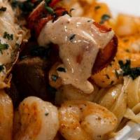 BussDown Hibachi Pasta  · Garlic  butter sautéed Crab, Shrimp  Steak Over Fettuccine Garlic Pasta Entrée Includes Garl...