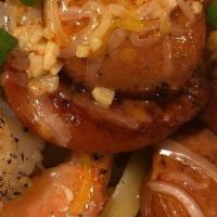 Bussdown Cajun Hibachi  · Shrimp, along side Beef Hotlinks. Over Flavorful Fettuccine Garlic Pasta Comes with Garlic b...