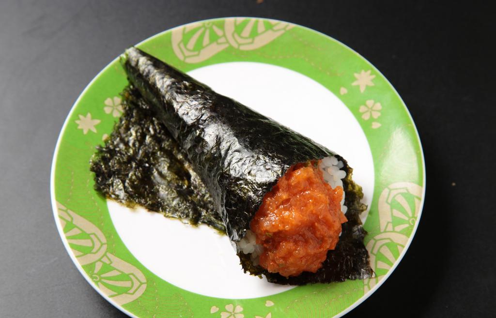 Spicy Tuna Temaki · Spicy tuna and cucumber hand roll.