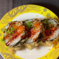 Eclipse Roll (9pcs) · Deep-fried spicy tuna cream cheese roll topped with tobiko spicy sauce.