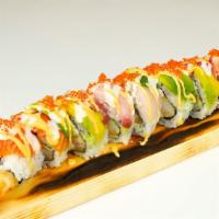 Rainbow Dragon Roll · Tempura shrimp, crab meat, avocado, topped with salmon, tuna, hamachi, tobiko and sauce.