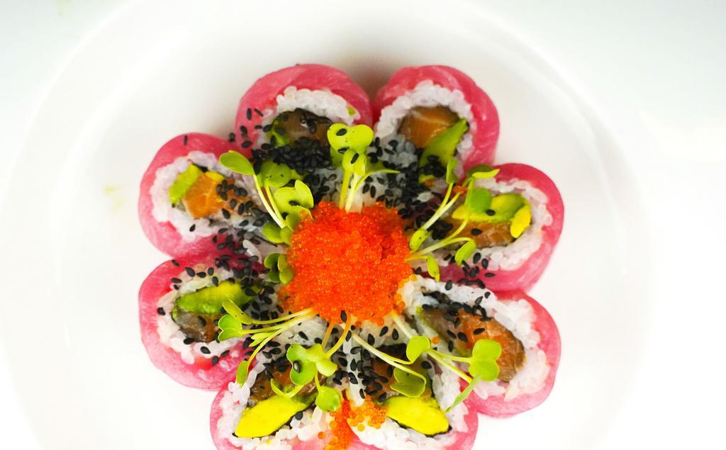 Cherry Blossom Roll · Salmon, avocado, topped with tuna, tobiko & sesame.