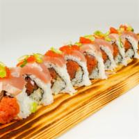 Tuna Lover Roll · Spicy tuna, topped with white tuna, green onion & spicy ponzu sauce.