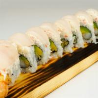Snow White Roll · Shrimp tempura, avocado, topped with crab meat & walu.