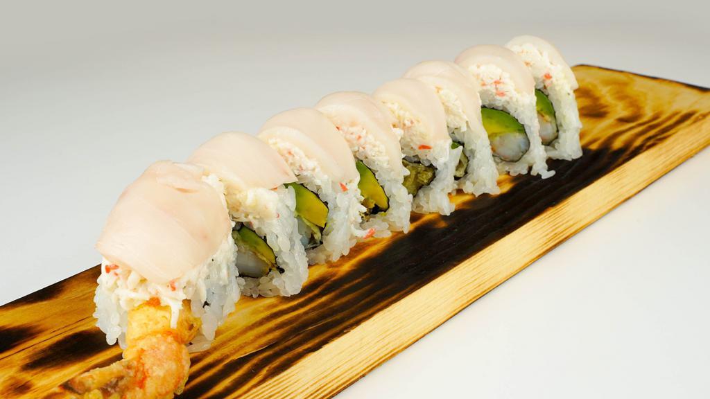 Snow White Roll · Shrimp tempura, avocado, topped with crab meat & walu.
