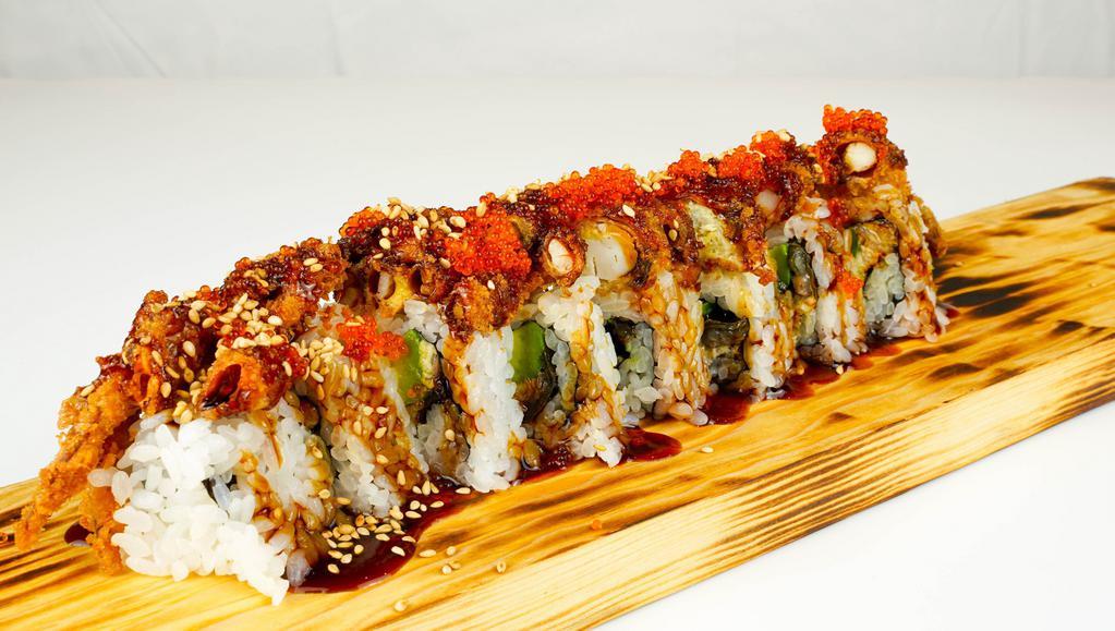 Super Spider Roll · Unagi, avocado, topped with soft shell crab, tobiko, sesame and sauce.