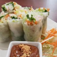 A1. Fresh Spring Rolls (3 Rolls) · Chicken, Shrimp, or Tofu: Rice paper filled with lettuce, bean sprouts, cucumber, rice noodl...