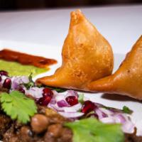 6 pieces Cocktail Samosa · Crispy patties stuffed with potatoes, peas, herbs & spices.