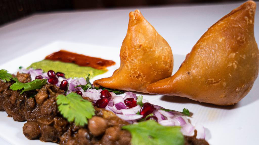 6 pieces Cocktail Samosa · Crispy patties stuffed with potatoes, peas, herbs & spices.