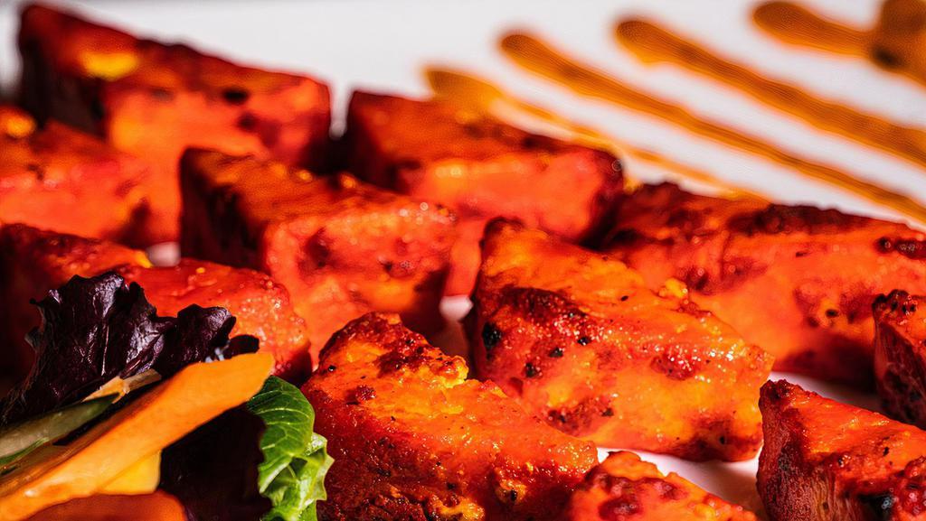 Cajun Paneer Tikka · Fresh cheese, marinated in yogurt, spices, fennel seeds & chilies; skewered and cooked in clay oven.