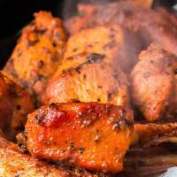 Peshawari Chicken · Cubes of boneless organic chicken thigh marinated with yogurt, ginger, garlic and spices, co...