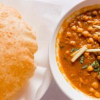 Peshawari Chana · Garbanzo beans cooked with onions, tomatoes and spices.