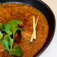 Kashmiri Roganjosh · Classic lamb curry from the valley of Jammu & Kashmir with spices & sauce.