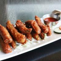Fried Chayote · Sweet Chayote hand dipped in ginger flour batter and fried until golden brown accompanied wi...