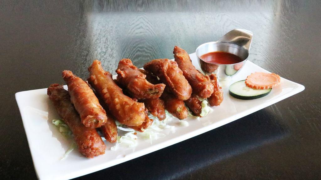 Fried Chayote · Sweet Chayote hand dipped in ginger flour batter and fried until golden brown accompanied with a chili sauce