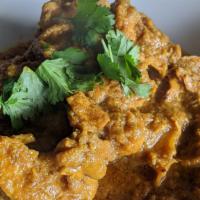 Chicken Curry · Chicken stewed in a tumeric and paprika curry spice with potatoes
