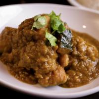 Kabocha Pumpkin Curry · Sweet kabocha pumpkin slow cooked until tender in tumeric
and paprika curry spice