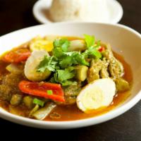 Okra Egg Curry · Onion garlic tomato based curry, fried hard boiled eggs, okra,
yellow onions, bell peppers, ...