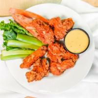 Diamond's Crispy Chicken Wings · Delicious breaded wings tossed in BBQ Sauce or Buffalo Sauce. Served with carrots and celery...