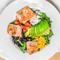 Southwestern Salmon · Fresh mix greens topped with grilled salmon, blue cheese crumble, diced tomatoes, black bean...