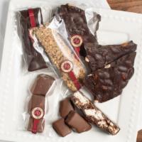 Chocolate Pouch Extravagaza · Cello bag of: milk honey comb (three-five pieces), dark rocky road bar (slice it and share!)...