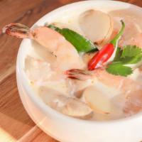 Tom Kha Soup · Thai style coconut milk soup, mushrooms, galangals, and lemongrass.