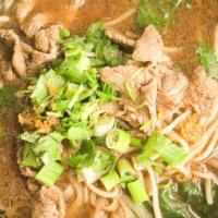 Beef ball Noodle Soup · Spinach, bean sprouts in a beef broth

Topped with fried garlic, green onions and cilantro.