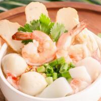 Seafood Noodle Soup · Shrimp, calamari, imitation crabmeat, sliced fish cakes, fish balls, scallops, white mushroo...