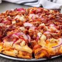 Ernie's New BBQ Chicken Pizza · BBQ chicken, pinch of bacon, red onion, diced tomato, pineapple, BBQ drizzle on top.