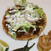 Sopes · A sope is a popular street snack. A sope is a handmade corn shell that we like to think of a...