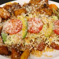 Enchiladas Michoacanas · 4 enchiladas, grilled chicken, cheese, cream, potatoes and carrots.