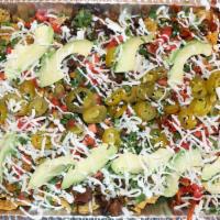 Mega Nachos (Tres Carnes) · Delicious Nachos for 6-8 people. Depending how hungry you are. LoL - Crispy organic tortilla...