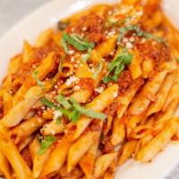 Penne Bolognese · Penne pasta tossed with our classic homemade meat sauce.