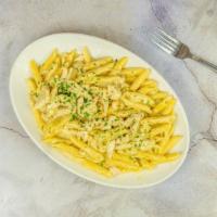 Penne Chicken Alfredo · Penne pasta served with alfredo sauce, butter, and chicken.